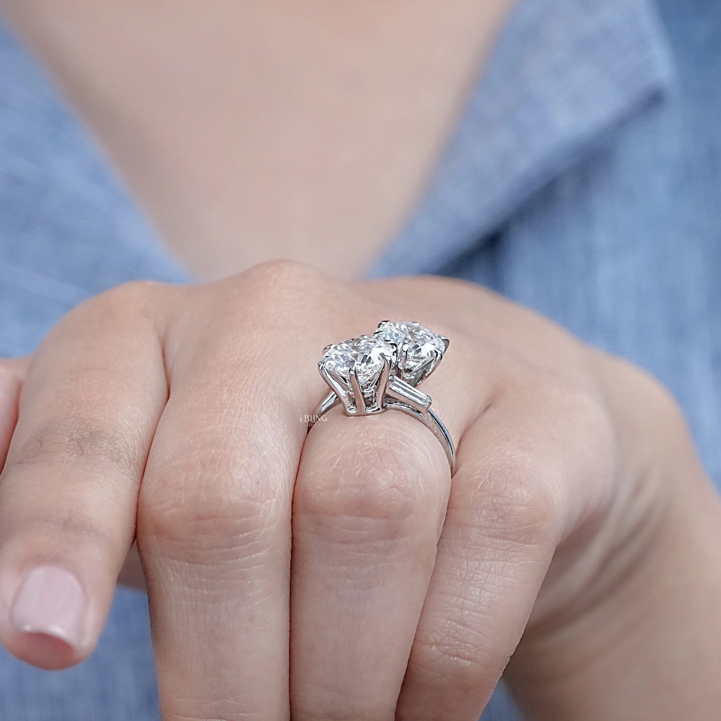4 carat lab grown diamond engagement ring on hand showing basket setting