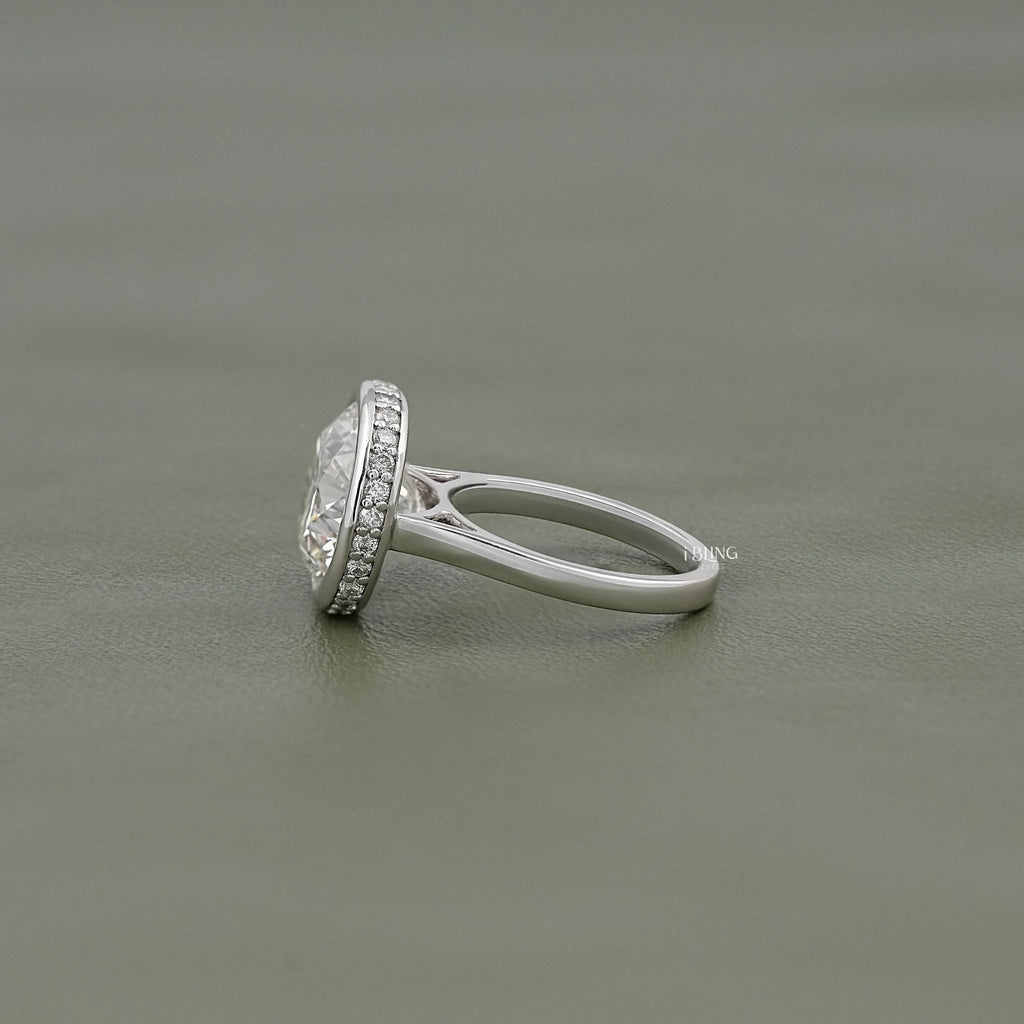 Round Cut Bezel Set Hidden Halo Engagement Ring