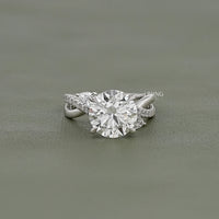 Round Cut Three Stone Twisted Accent Ring