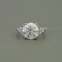 Round Cut Solitaire Accent Diamond Ring
