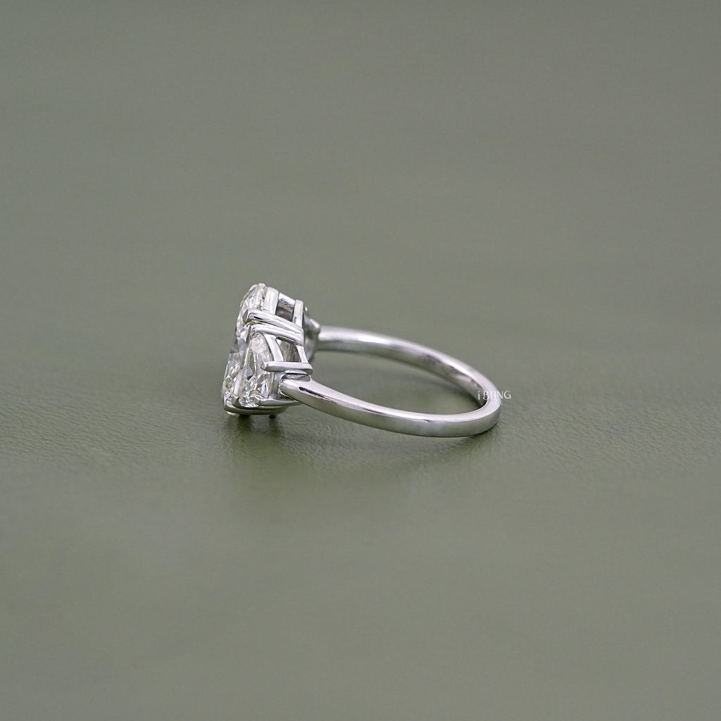 Oval Cut Diamond Three stone Engagement Ring