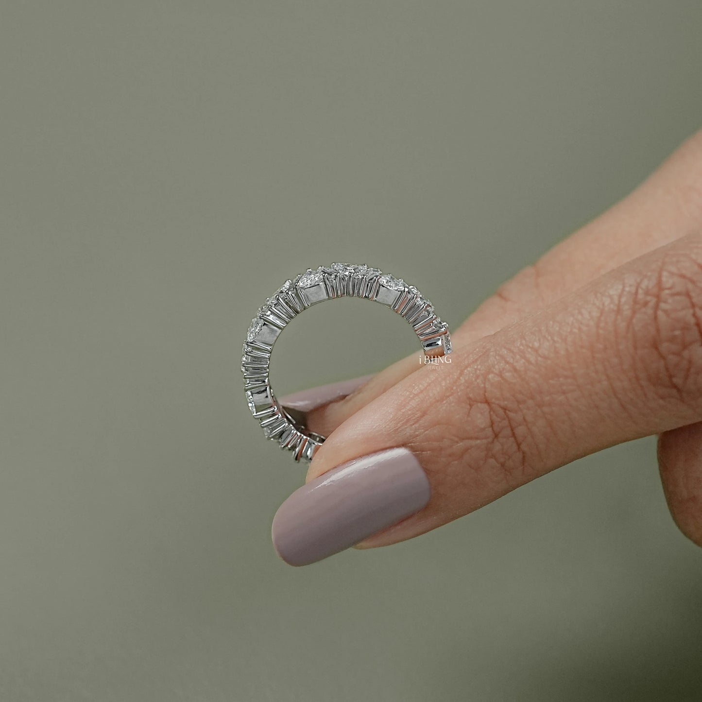 Top view trillion cut diamond eternity band designed with baguette accents