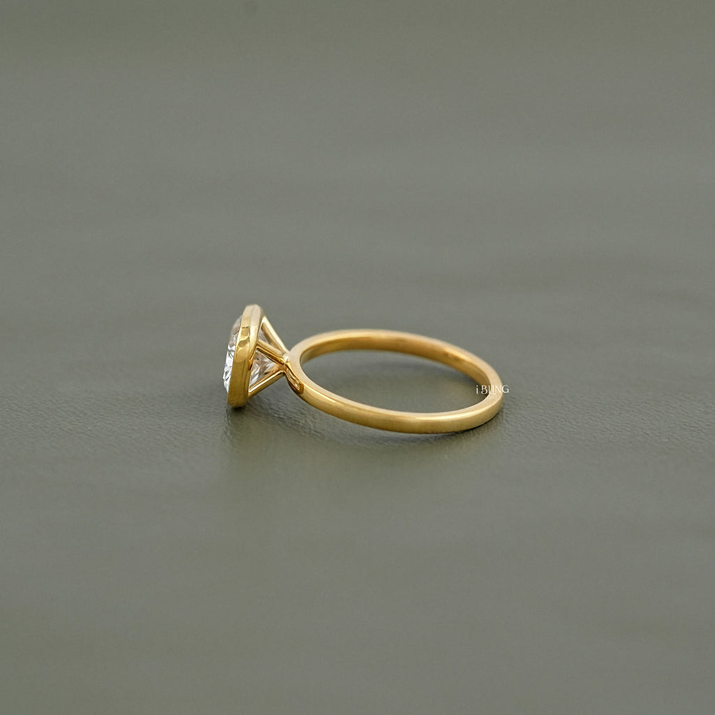 East West Cushion Cut Bezel Solitaire Engagement Ring