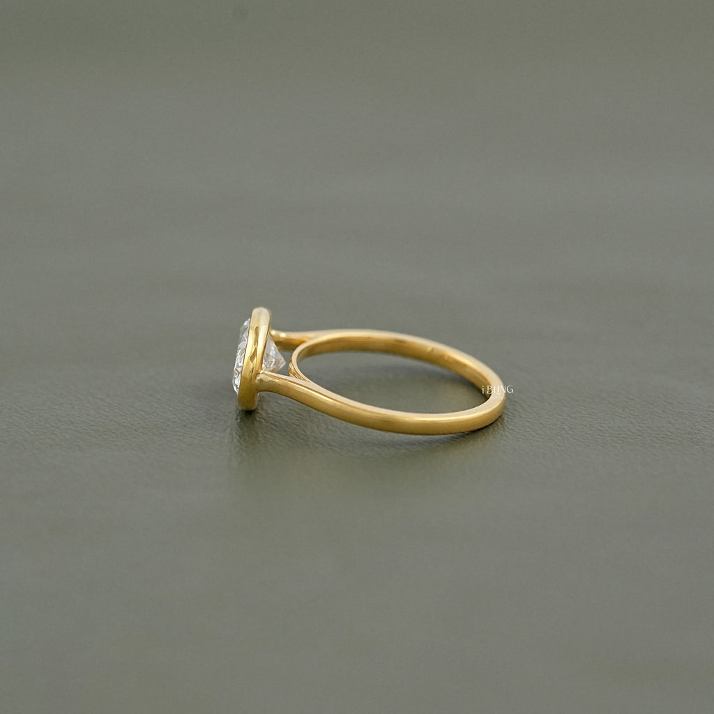 East West Oval Lab Diamond Bezel Set Engagement Ring