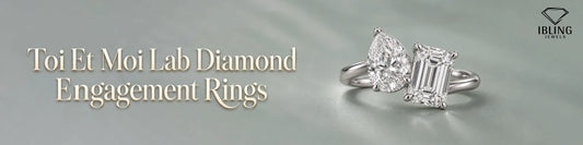 Lab diamond Toi et Moi engagement ring from Ibling Jewels with pear and emerald cut stones in a sleek design.