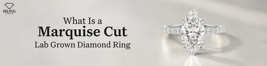 Lab grown marquise cut diamond ring on a neutral background, from Ibling Jewels design with elongated center diamond.