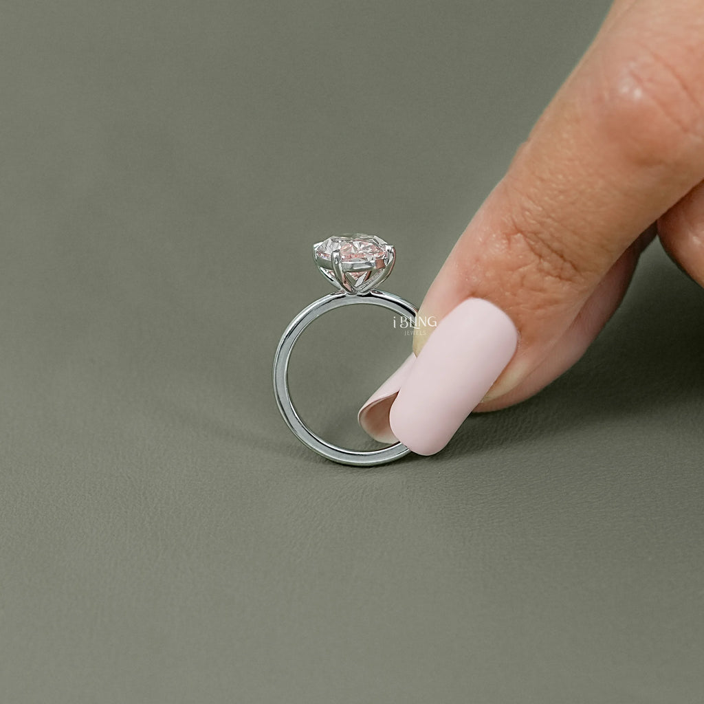 Fancy Vivid Pink Oval Diamond Engagement Ring