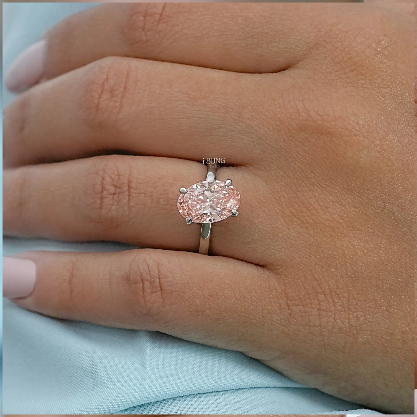 Fancy Vivid Pink Oval Diamond Engagement Ring