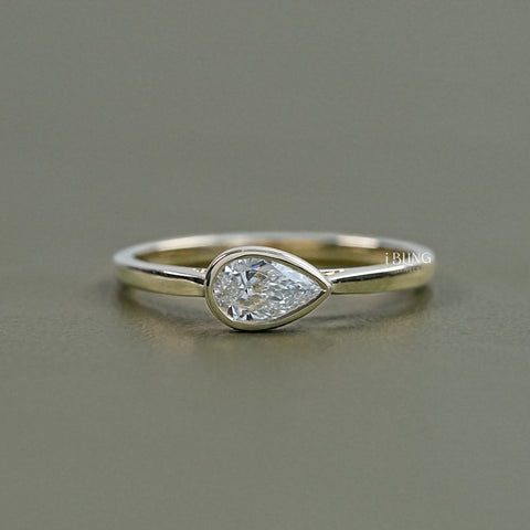 East West Pear Diamond Bezel Set Engagement Ring