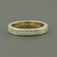 Round Diamond Channel Set Eternity Wedding Band