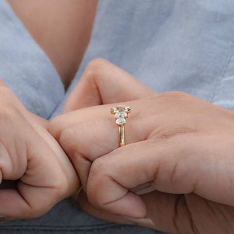 Half Bezel Set Emerald And Oval Five Stone Engagement Ring