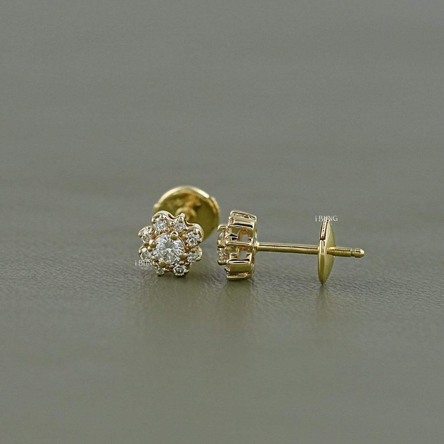 Side view diamond halo stud earrings styled in floral round diamond setting