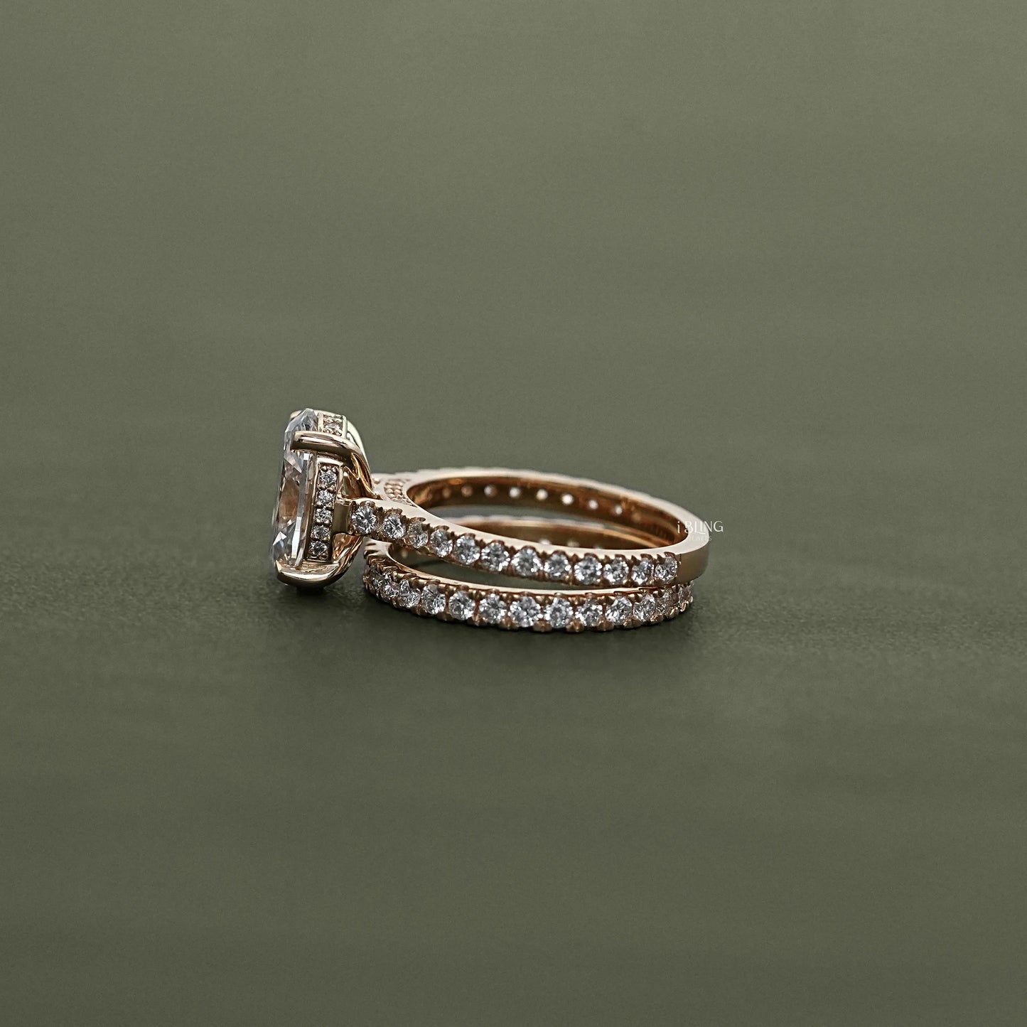 Side view of Oval Cut Diamond Bridal Set Ring with matching pave band, modern jewelry choice