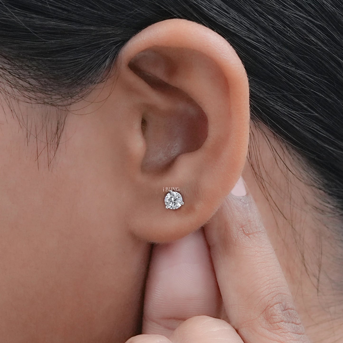 Model showing Round Cut Lab Diamond Solitaire Stud Earrings, perfect daily wear accessory