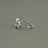 Oval Cut Diamond Solitaire Cluster Engagement Ring