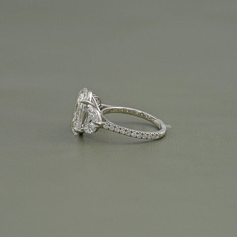 Oval Cut Diamond Solitaire Cluster Engagement Ring