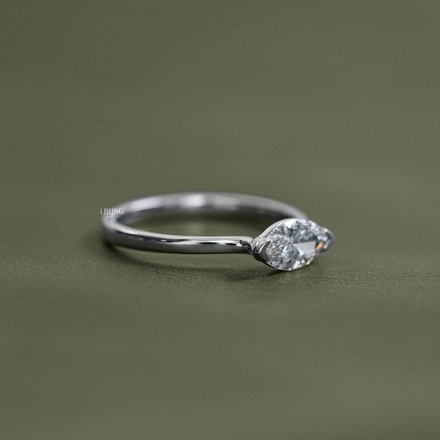 Side view of Marquise East West Diamond Solitaire Ring crafted as a modern minimalist piece