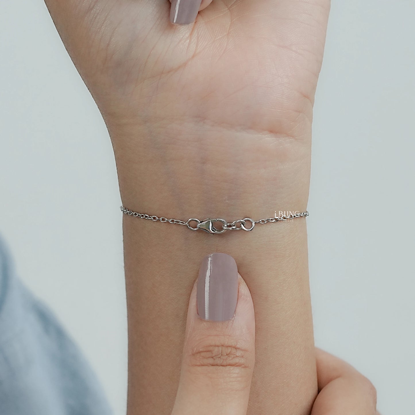 Back view lab grown diamond bracelet women styled in marquise bezel layout