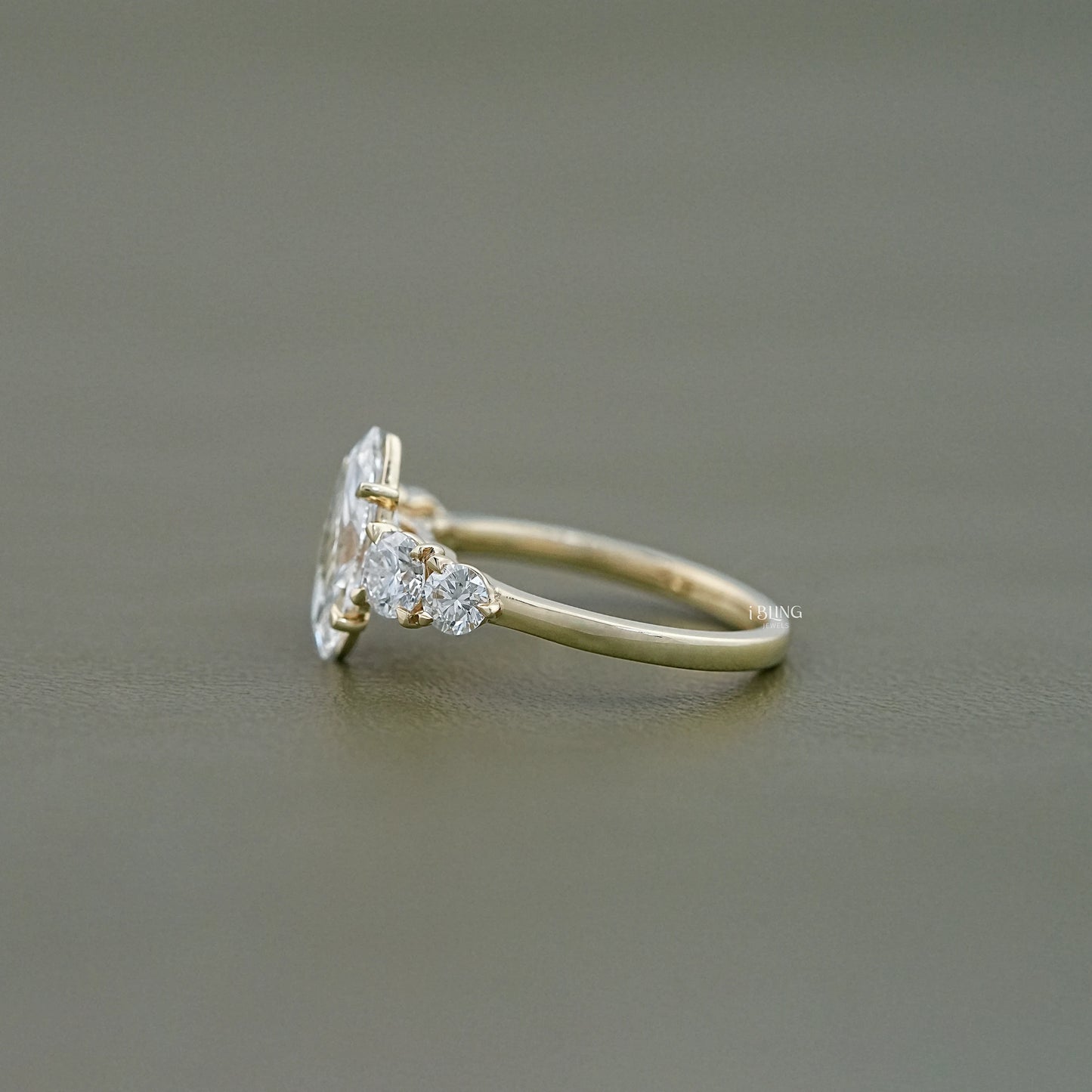 Side view of Round and Marquise Engagement Ring ideal for anniversary