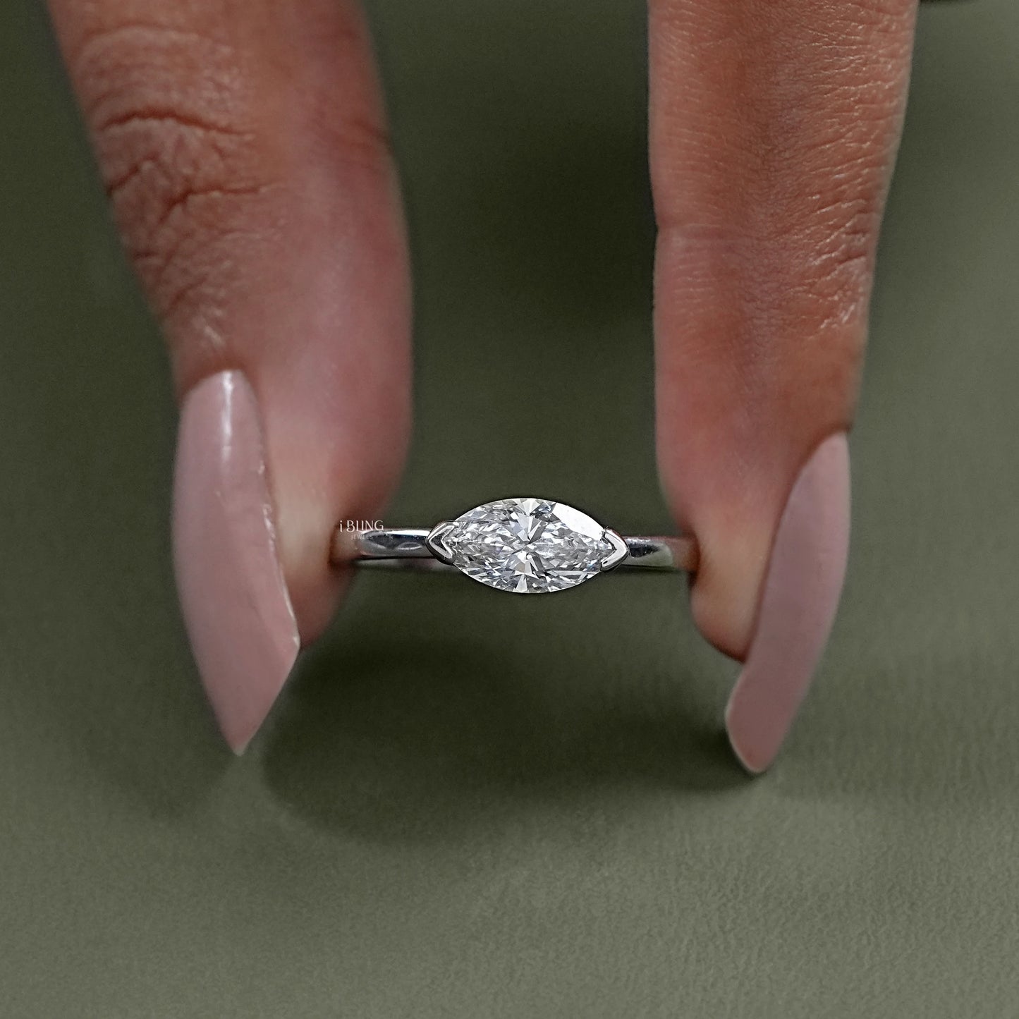 Front view of Marquise Diamond Ring with East West setting, ideal luxury gift for special moments