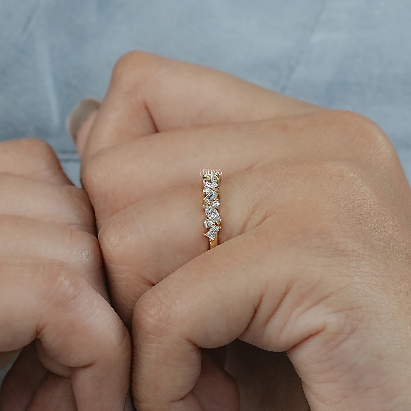 Model hand lab diamond half eternity band styled in modern multi shape layout