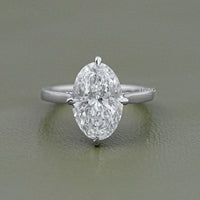 Oval Cut Hidden Halo Solitaire Engagement Ring