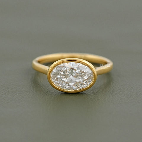 East West Oval Lab Diamond Bezel Set Engagement Ring