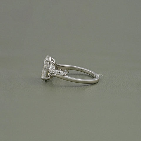 Oval Cut Diamond Solitaire Accent Engagement Ring