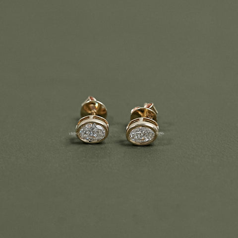 Oval Cut Lab Diamond Bezel Set Stud Earrings