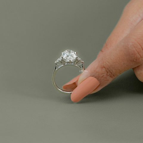 Oval Cut Solitaire Accent Diamond Ring
