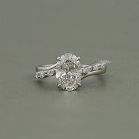 Oval Cut Diamond Solitaire Accent Engagement Ring