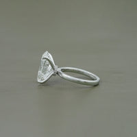 Oval Cut Solitaire Hidden Halo Engagement Ring