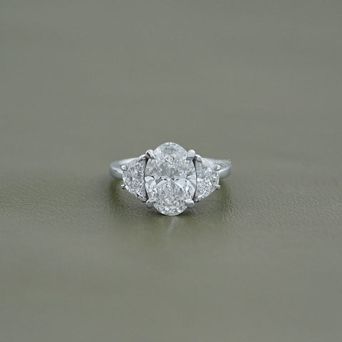 Oval Cut Diamond Three stone Engagement Ring