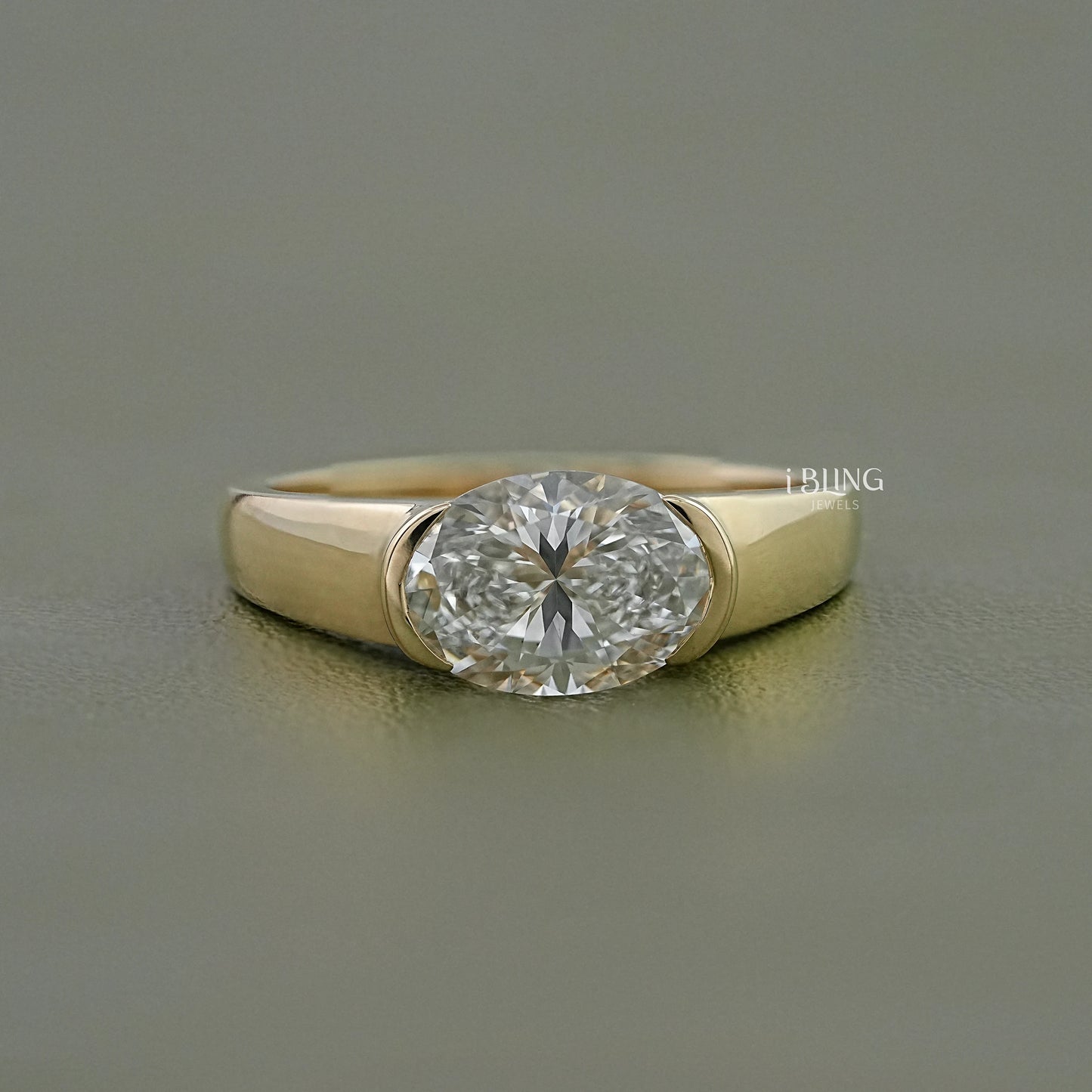 Oval Cut Diamond Half Bezel Set Solitaire Ring