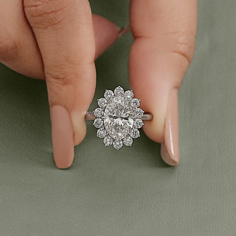 Oval Diamond Halo Solitaire Engagement Ring