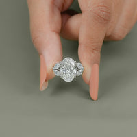 Oval Cut Diamond Solitaire Cluster Engagement Ring