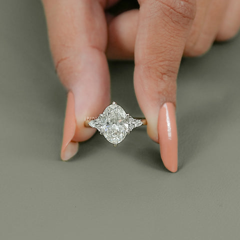 Oval Cut Solitaire Accent Diamond Ring