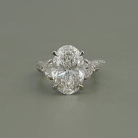 Oval Cut Three Stone Accent Diamond Ring