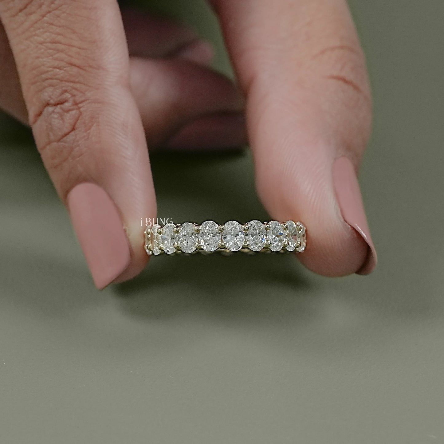 Front view full eternity band designed with oval lab diamonds