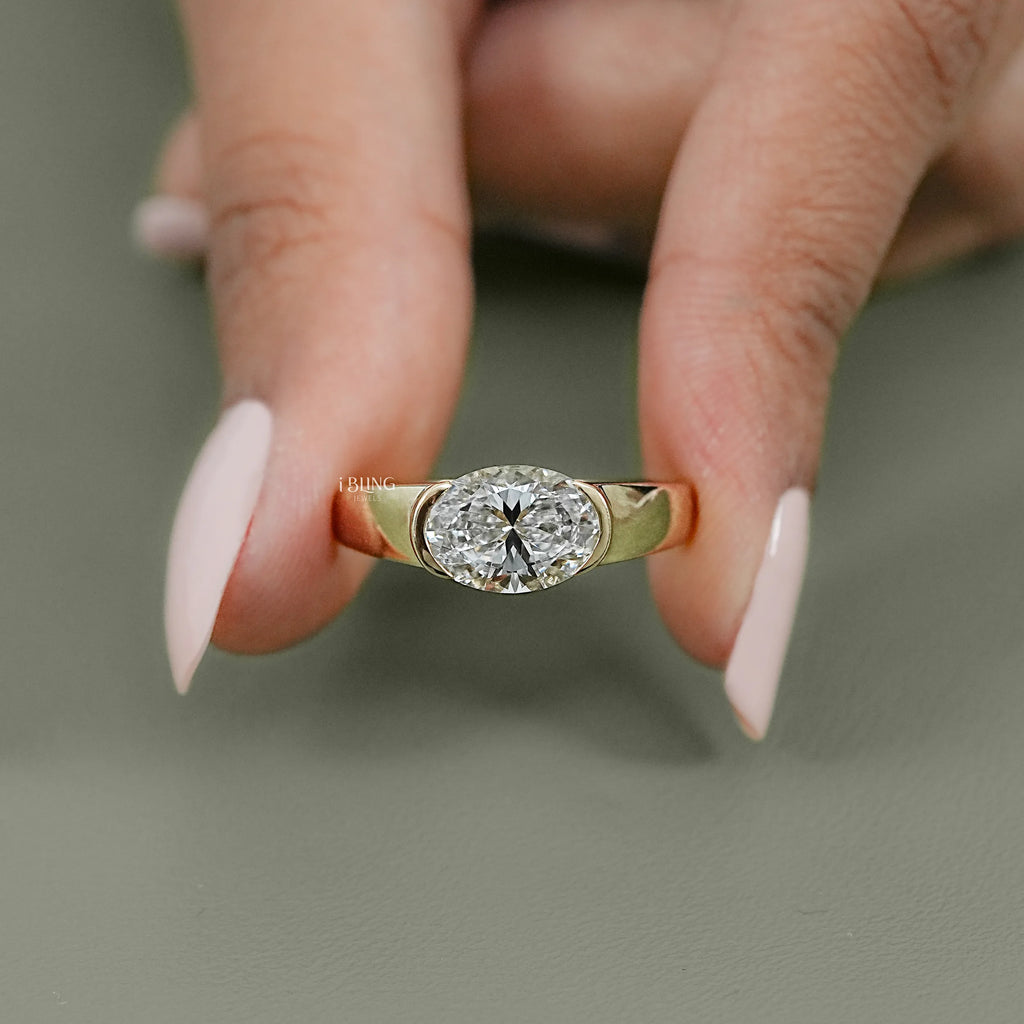 Oval Cut Diamond Half Bezel Set Solitaire Ring