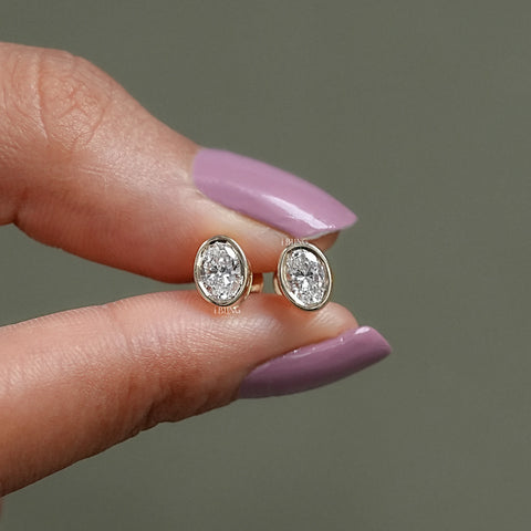 Oval Cut Lab Diamond Bezel Set Stud Earrings
