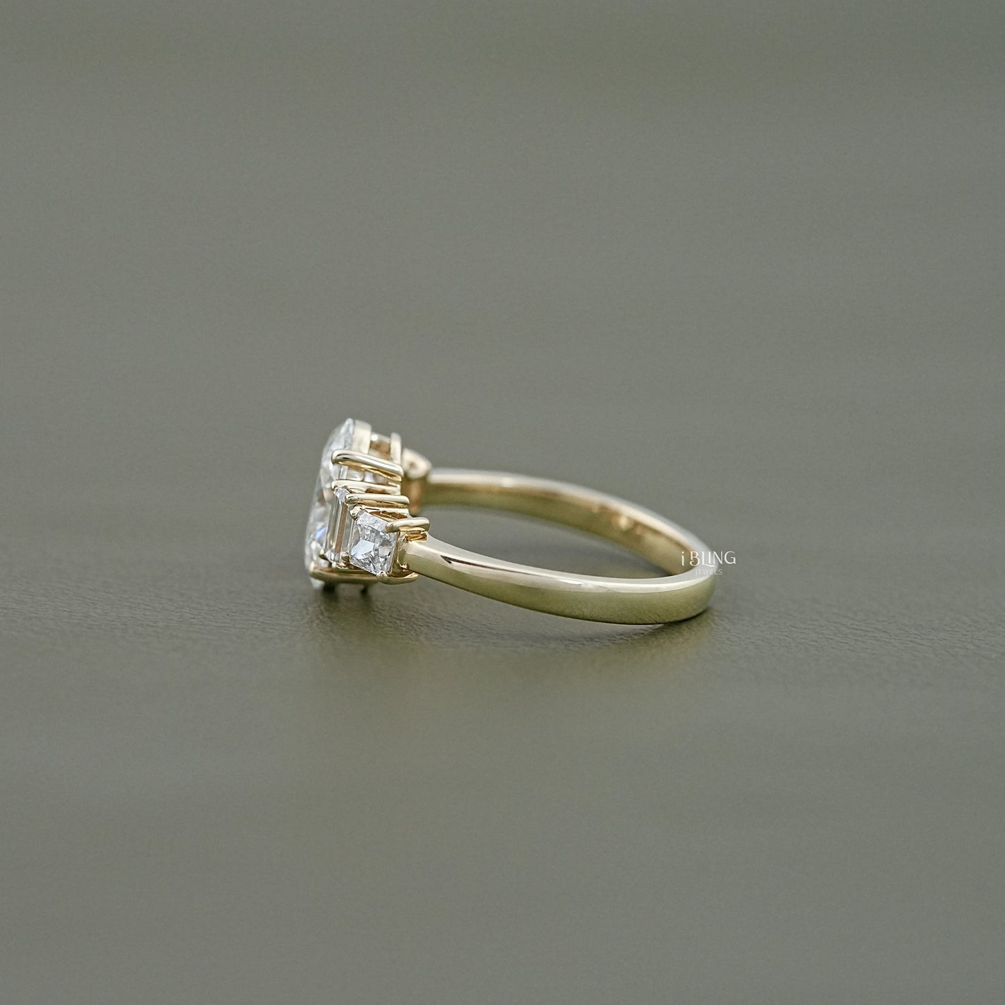 Side view of Oval Baguette Princess Five Stone Lab Grown Diamond Engagement Ring in 14K gold