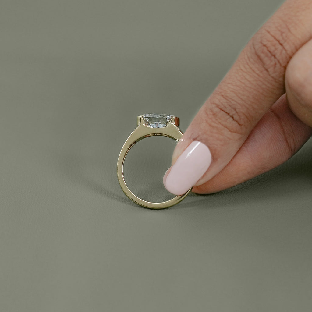 Oval Cut Diamond Half Bezel Set Solitaire Ring