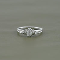 Oval Cut Lab Grown Diamond Three Stone Ring