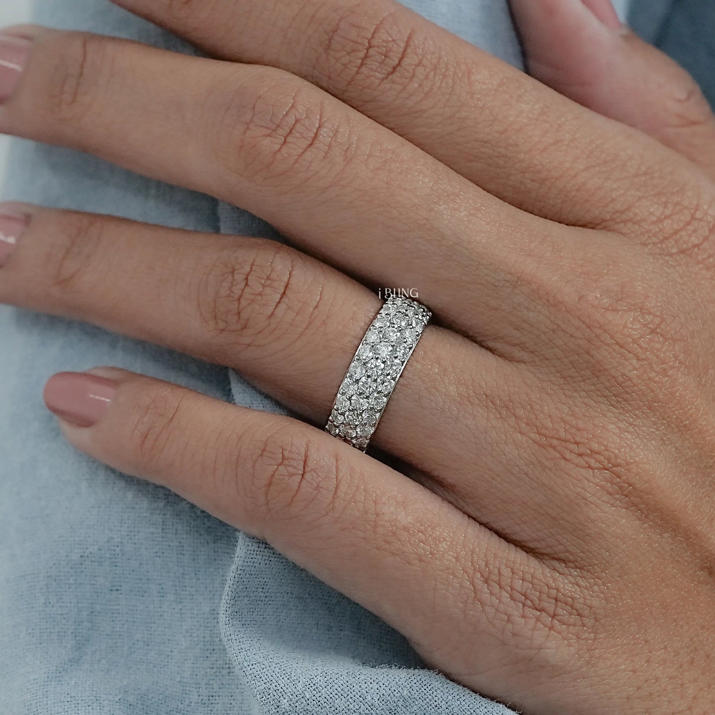 Woman hand Oval Eternity band Lab diamond styled for wedding wear