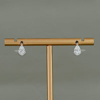 Pear Diamond Half Bezel Huggie Hoop Earrings