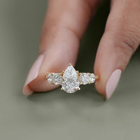 Pear And Round Cut Diamond Five Stone Engagement Ring