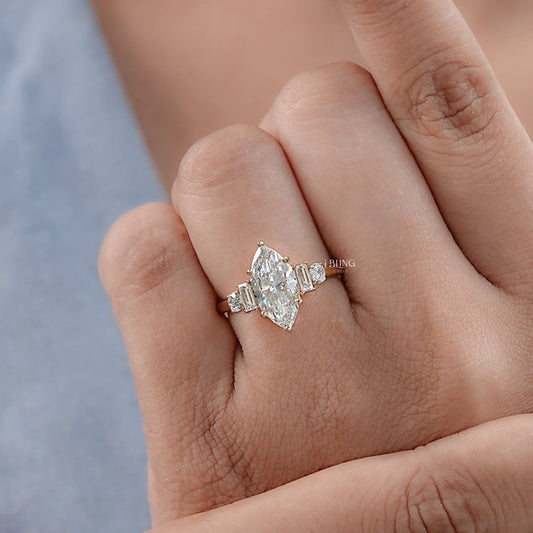 Woman hand wearing Engagement Rings lab Grown with Marquise and Baguette stones in White, Yellow, Rose gold