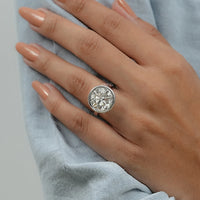 Round Cut Bezel Set Hidden Halo Engagement Ring