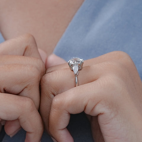 Round Cut Diamond Three Stone Ring With Pear Side Stones